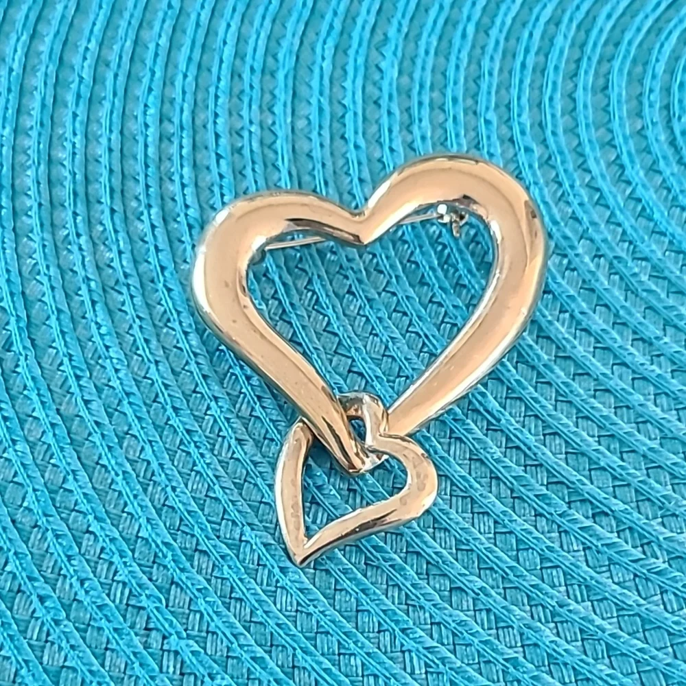 Elegant Gold Toned Double Heart Brooch